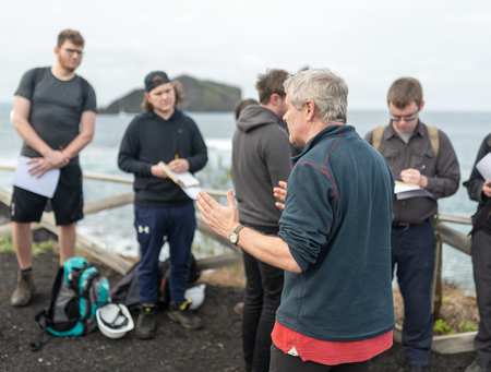 Research-active university - Associate Professor Duncan Pirrie teaches students on field trip to Azores