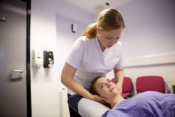 An outpatient receiving chiropractic treatment to the cervical spine