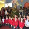 Pupils and Gill Ellis, headteacher of Coed Eva Primary School in Cwmbran, welcoming USW students to a Nativity Play on   December 2 . Neil Gibson