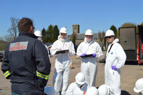 South Wales Fire and Rescue Fire Investigator Matt Jones discusses the elements of the fire scene and the investigation with the students.