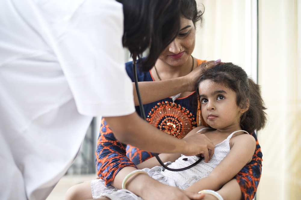 Indian child with doctor - Health Research GettyImages-997771842.jpg