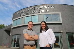 Paul Rainer, Head of Sport Coaching at USW, and Ria Male, Head of Development at Hockey Wales. MOU between USW and Hockey Wales. May 2018