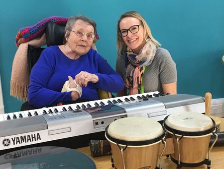 Betty and Lynnsey, MA Music Therapy student, at City Hospice