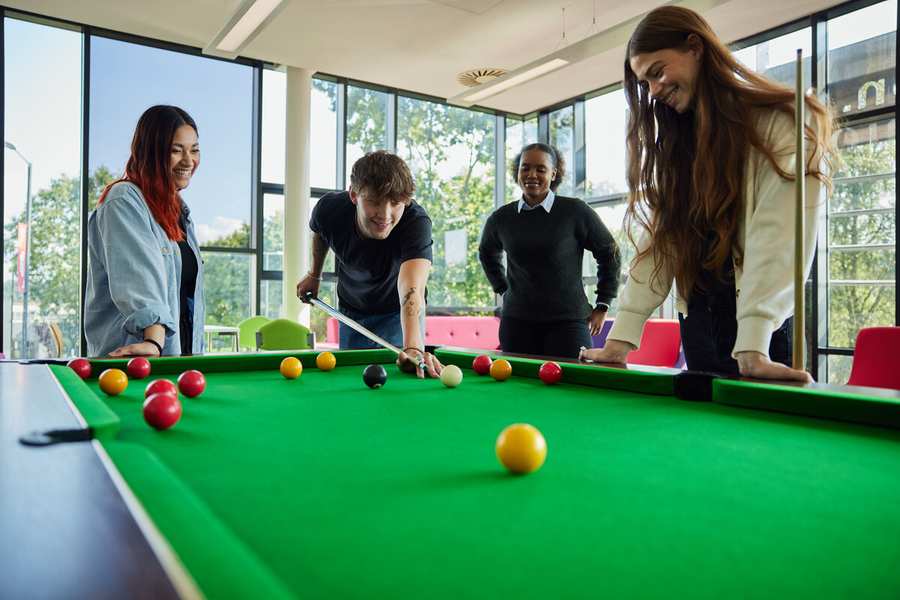 Students playing pool in the Students Union